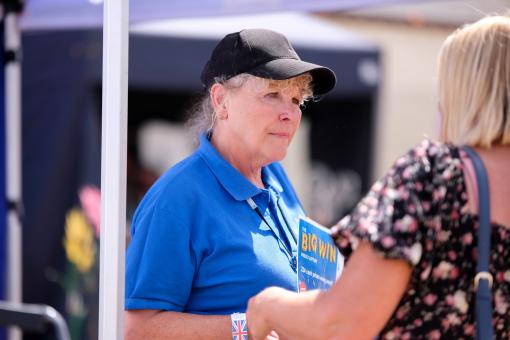 Fundraiser for Alzheimer's Society talking to a supporter